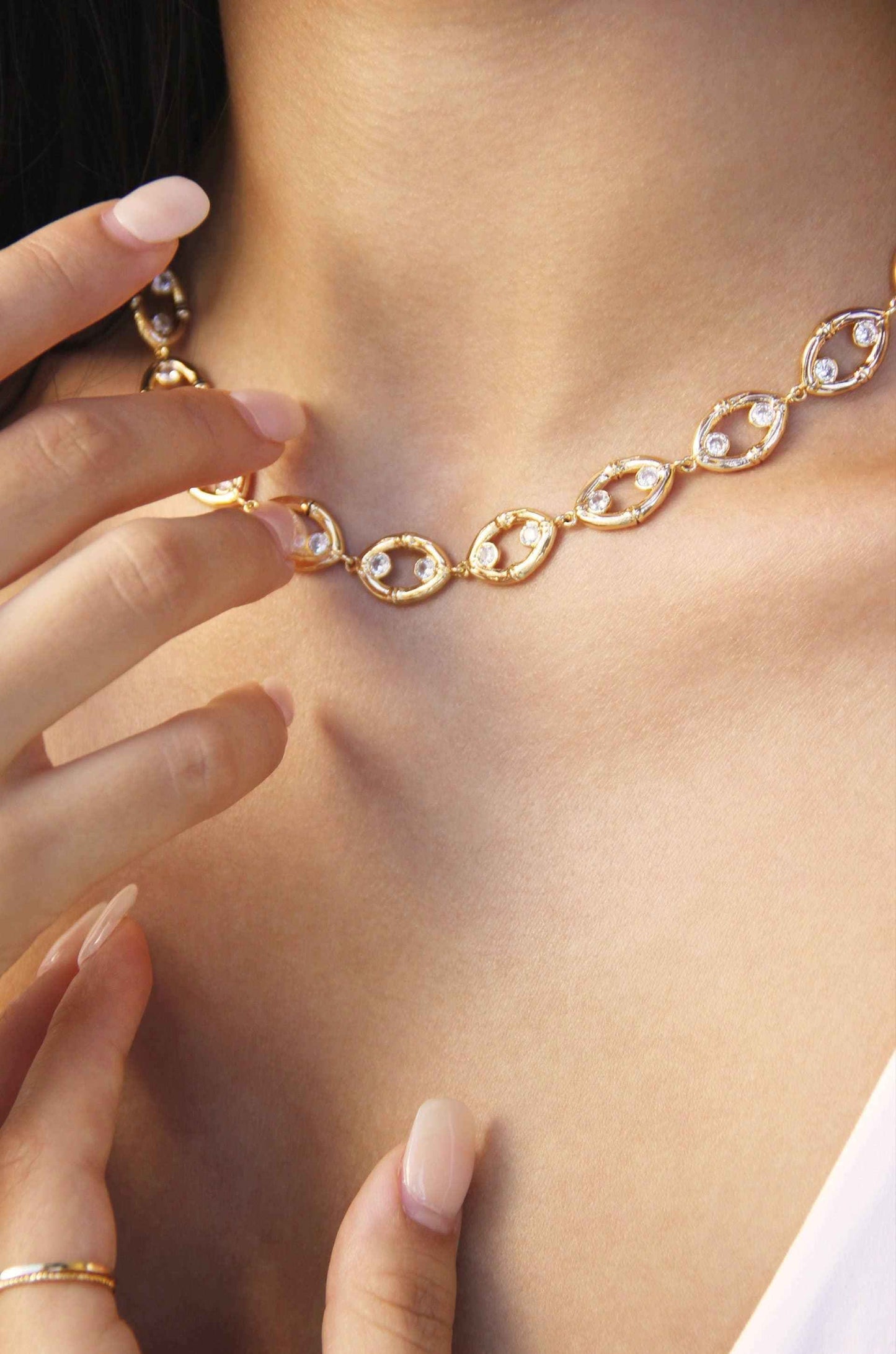Crystal and Gold Collar Necklace with Bamboo Eyelet Design