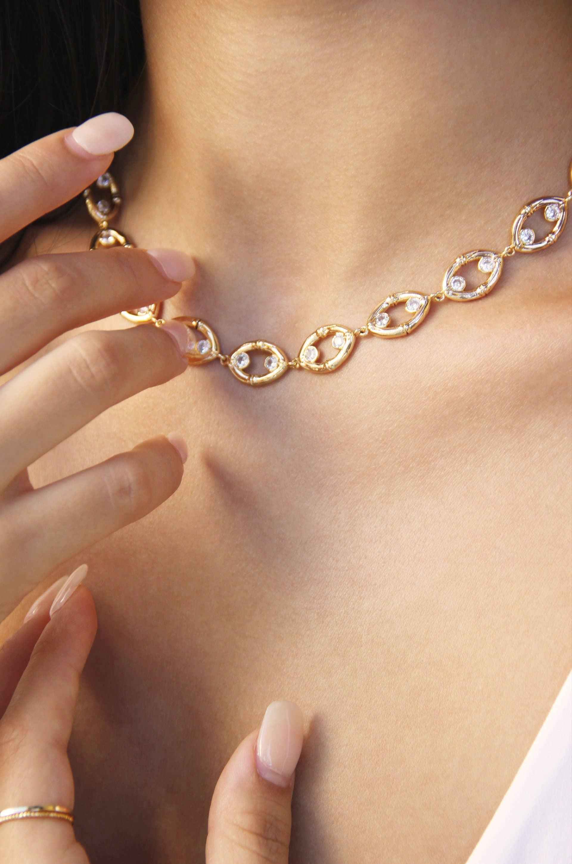 Crystal and Gold Collar Necklace with Bamboo Eyelet Design