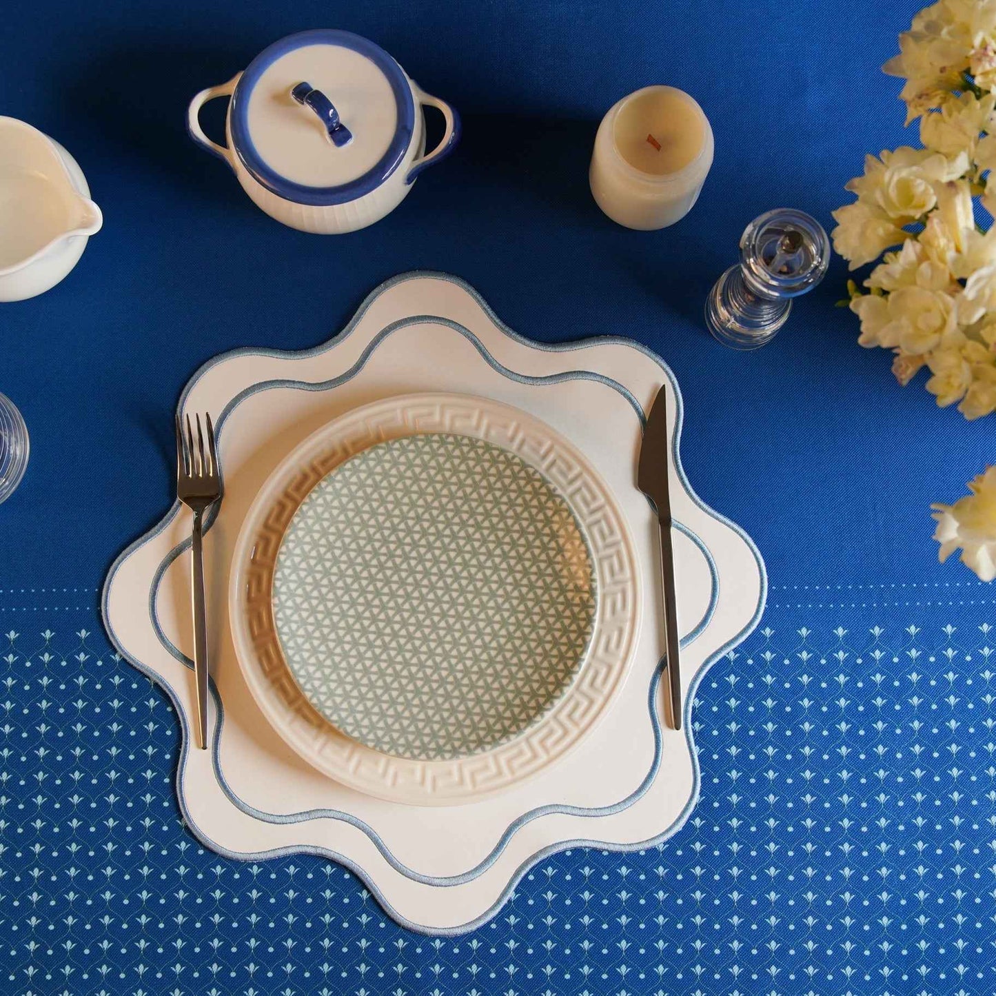 HAVEN WHITE WAVY EDGE BLUE TRIM FAUX LEATHER PLACEMAT